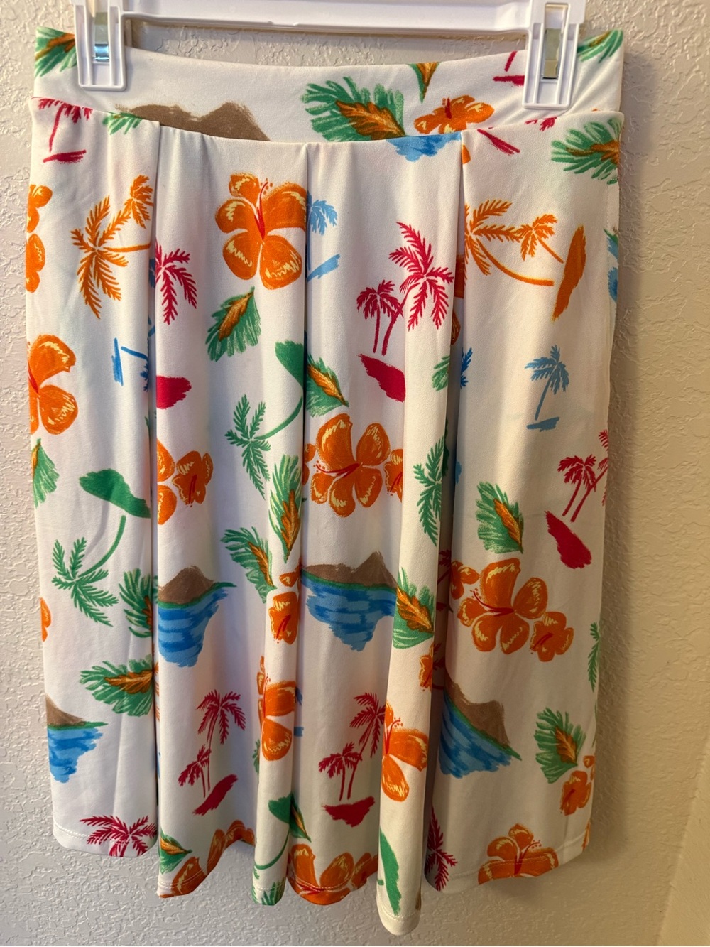 Size Small LuLaRoe Madison skirt, white with vibrant tropical print